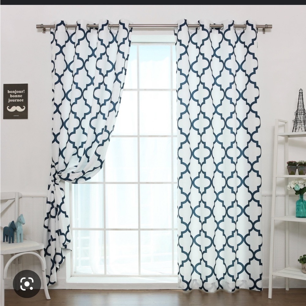 2 curtain panels on aqua blue and white. Pet free and Non smoking home.